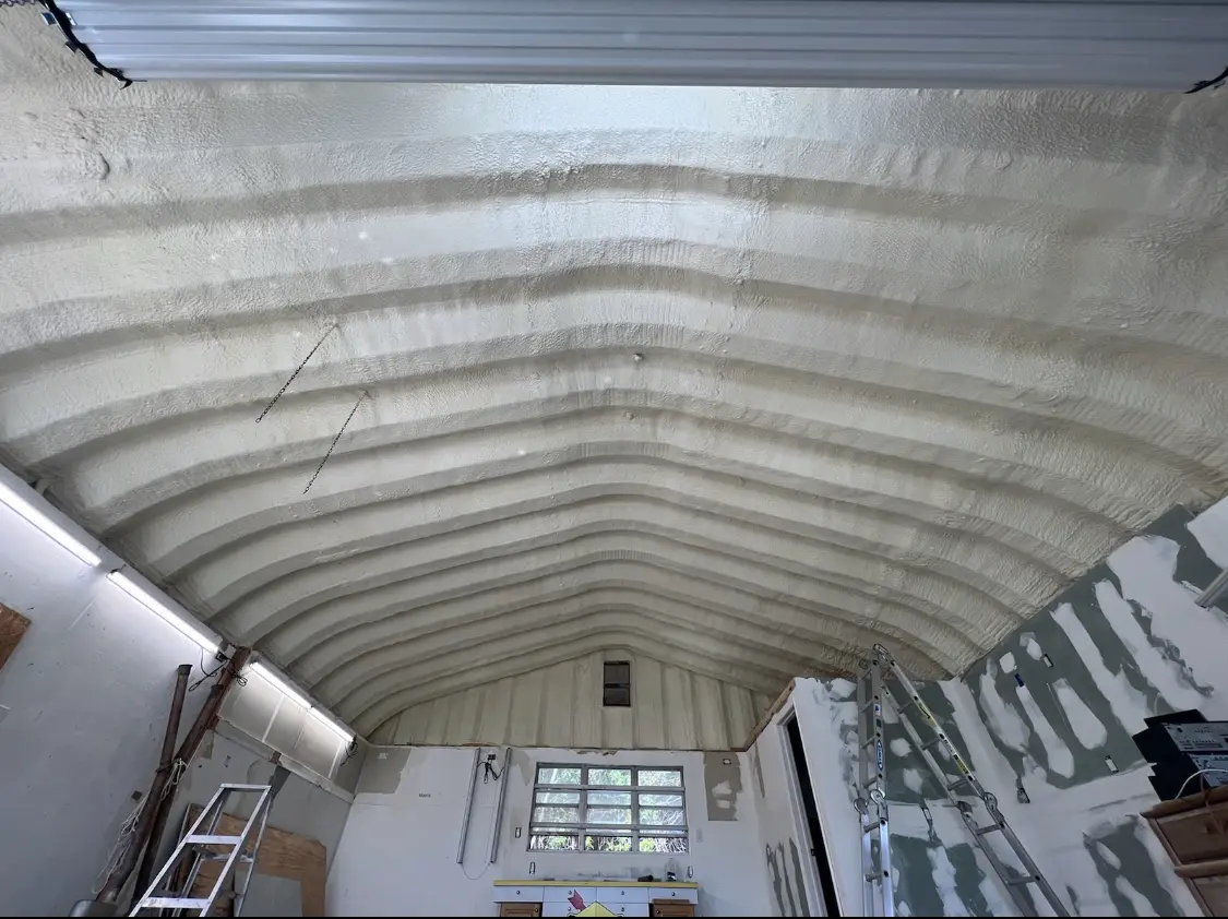 Spray polyurethane foam applied to the underside of a metal roof deck in Stroudsburg